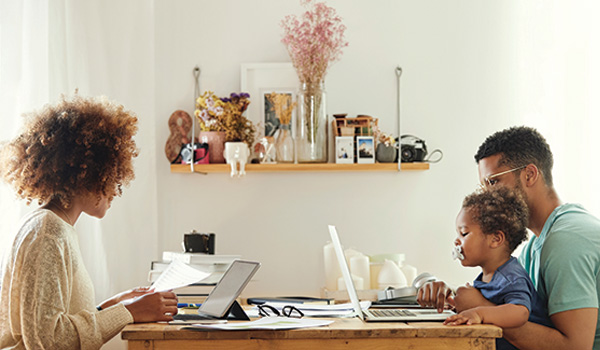 family-at-table-on-computers