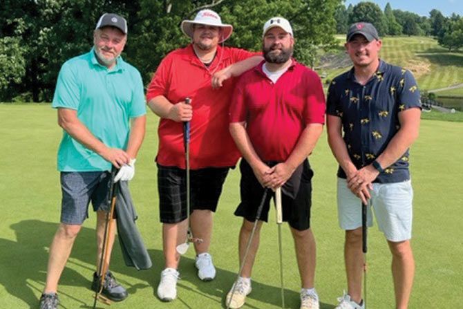 KTA-Golf-Classic-red-shirts-group-with-clubs