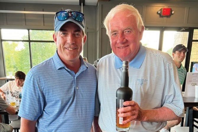 KTA-Golf-Classic-two-men-with-scotch